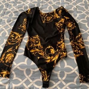 New without tag.. I only tried it on.. The bodysuit is not for me